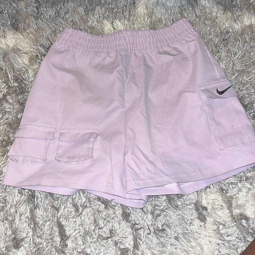 Size M women’s Nike shorts in the lavender color way